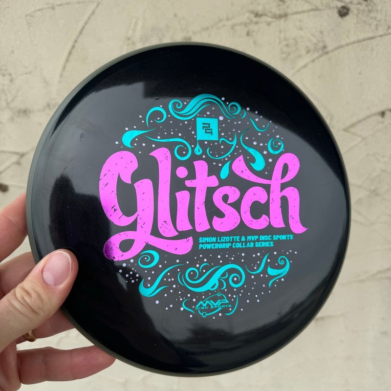 Auction! Jan ’24 – MVP R2 Neutron Glitch with Blue Rim Glow Glitsch – A Simon Lizotte & Powegrip Collab Stamp – 149g – Solid Black