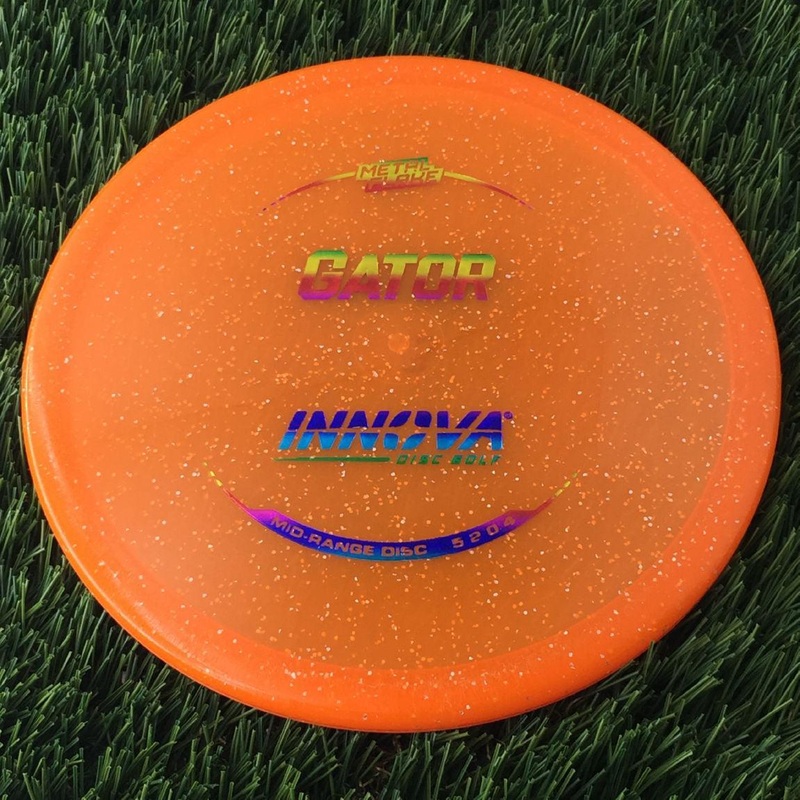 Innova Champion Metal Flake Gator with Burst Logo Stock Stamp – 172g – Translucent Orange