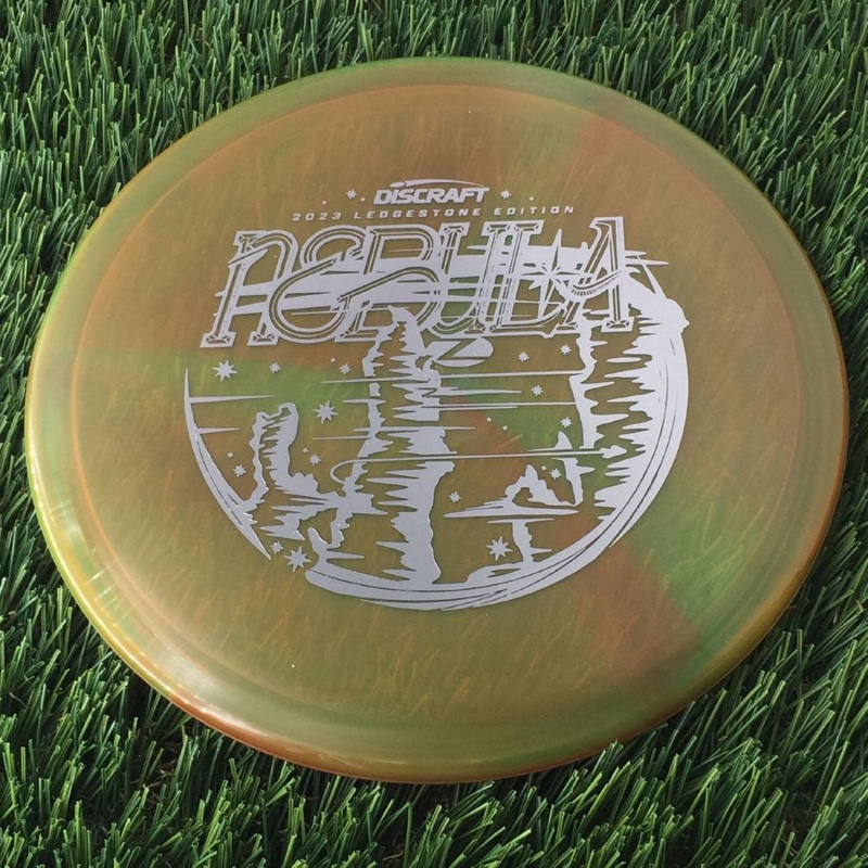 Discraft Elite Z Swirl Nebula with 2023 Ledgestone Edition – Wave 1 Stamp – 172g – Translucent Brown