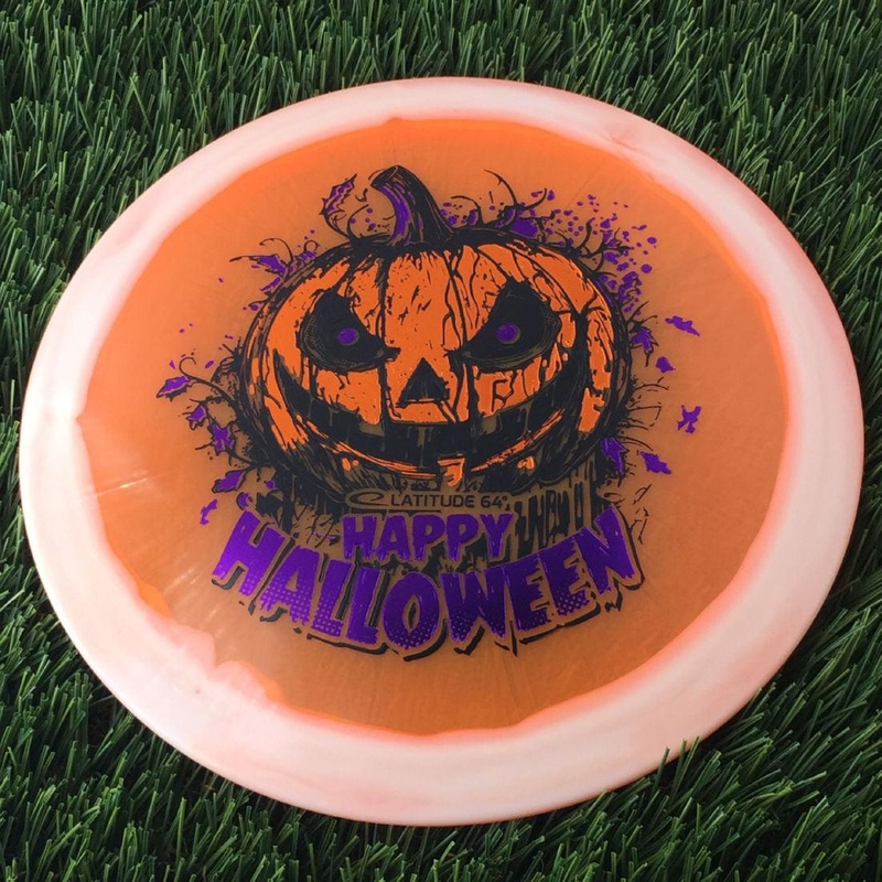 Latitude 64 Opto Ice Orbit Saint Pro with Happy Halloween Spooky Pumpkin – Triple Foil 2024 Stamp – 174g – Translucent Orange