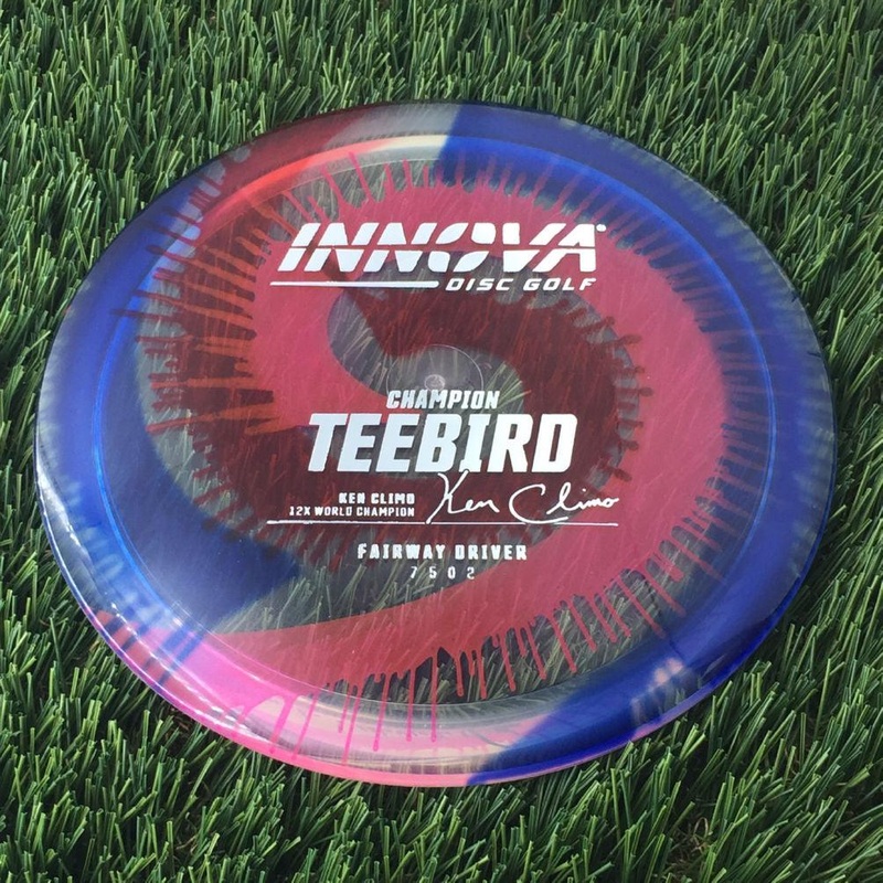 Innova Champion I-Dye Teebird with Ken Climo 12x World Champion Burst Logo Stamp – 175g – Translucent Dyed