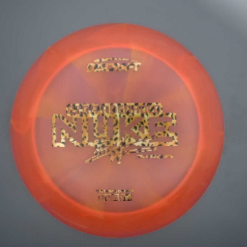 Discraft Elite Z Swirl Nuke with Ezra Aderhold 2025 Tour Series Stamp – 174.6g – Red
