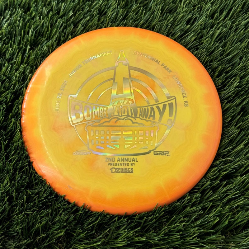 Discraft ESP Swirl Luna with Bombs Away Junior Tournament 2024 | Lawrence, KS | Presented by DZDiscs, Discraft, and GRIPeq w/ 2023 Discraft Tour Series Bottom Stamp Stamp – 172g Light Orange