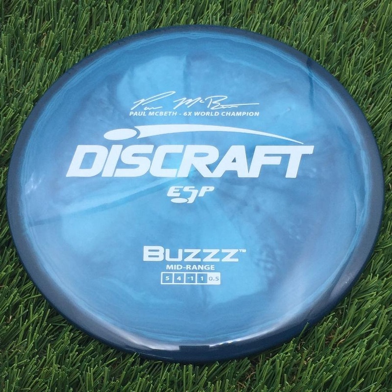 Discraft ESP Buzzz with Paul McBeth – 6x World Champion Signature Stamp – 175.5g – Deap sea Blue