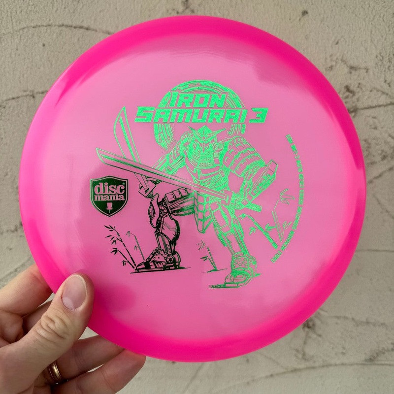 Auction! Jan ’24 – Discmania Italian C-Line Color Glow MD3 with Iron Samurai 3 – Eagle McMahon Signature Series Stamp – 180g – Translucent Pink