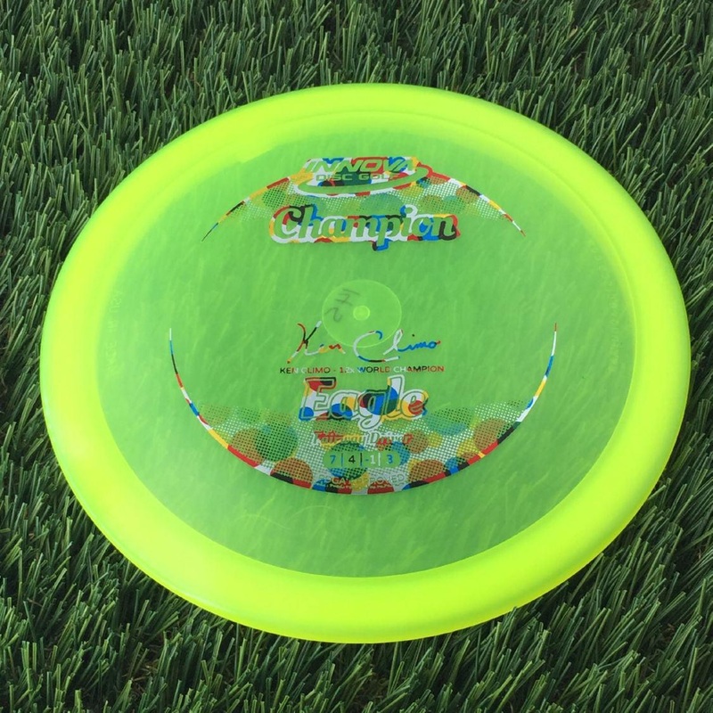 Innova Champion Eagle with Ken Climo – 12x World Champion New Stamp Stamp – 145g – Translucent Yellow