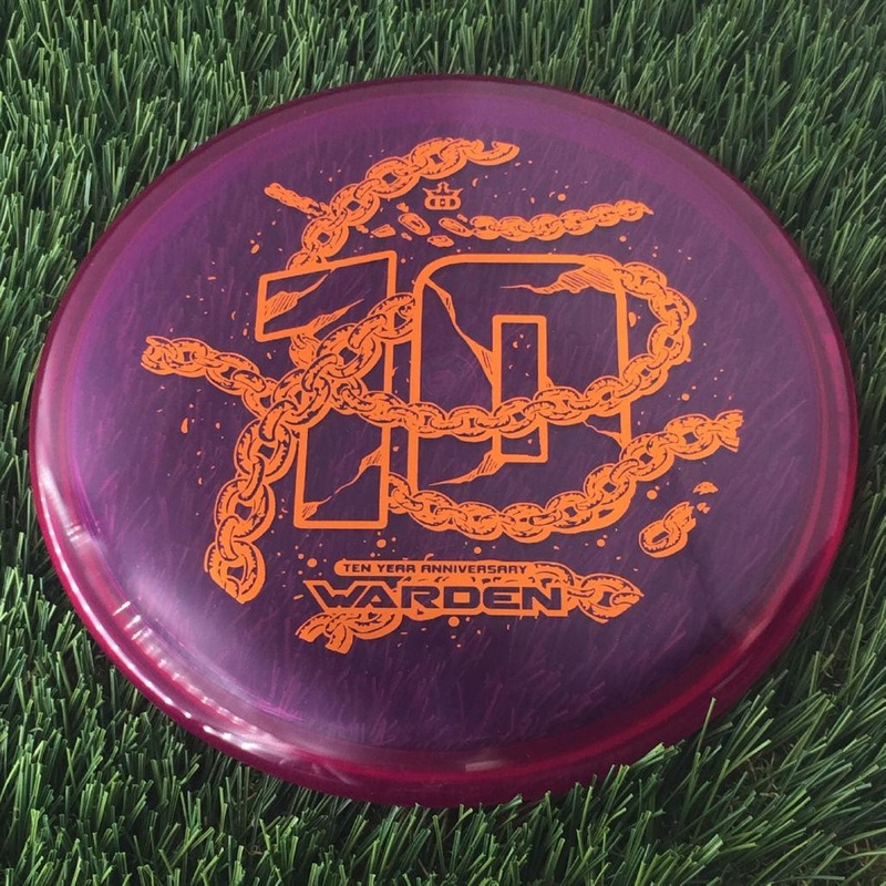 Dynamic Discs Lucid Ice Warden with Ten Year Anniversary Edition Breaking Chains Stamp – 176g – Translucent Purple