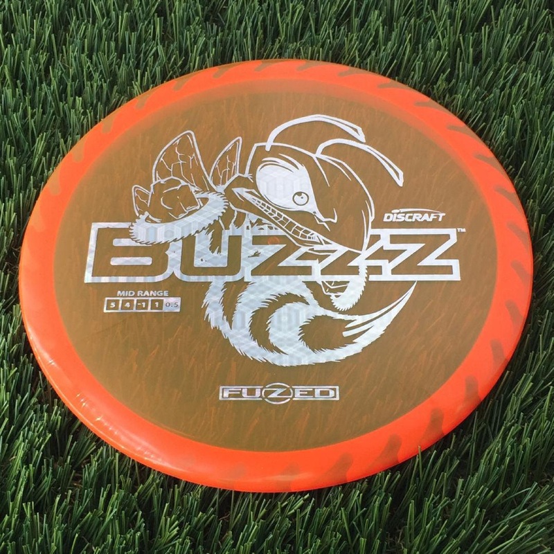 Discraft Elite Z FuZed Line with Saw Pattern Buzzz with Big Bee with Saw Blade – “Buzzzsaw” Stamp – 180g – Translucent Orange