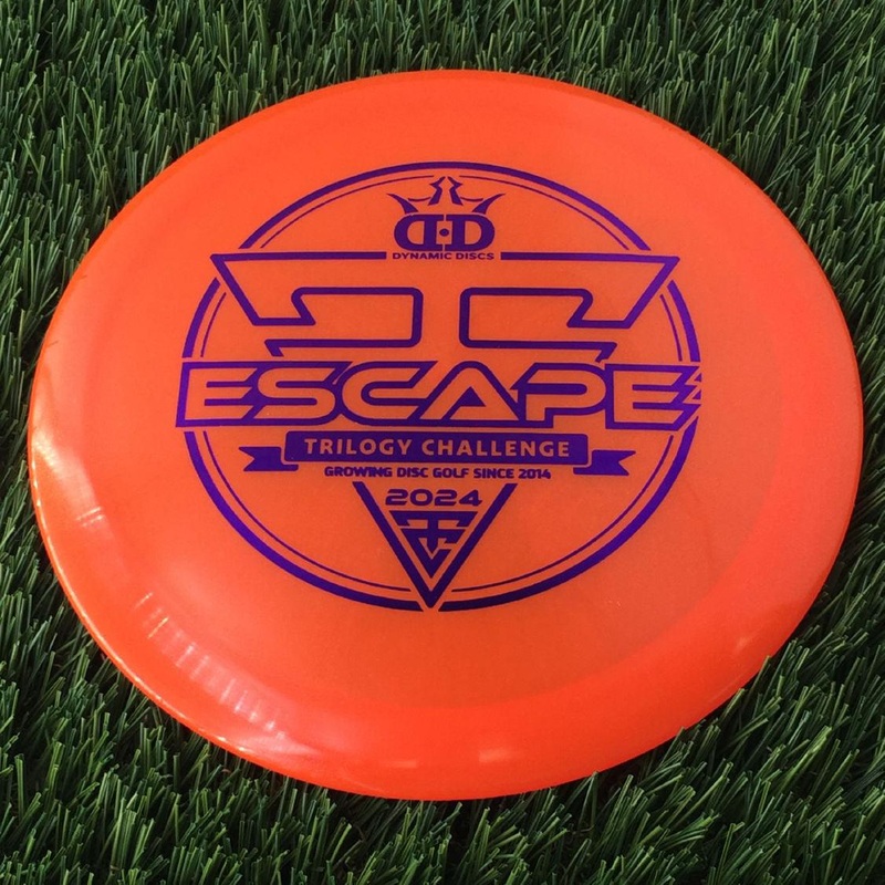 Dynamic Discs Lucid Ice Glimmer Escape with 2024 Trilogy Challenge Stamp – 172g – Translucent Orange