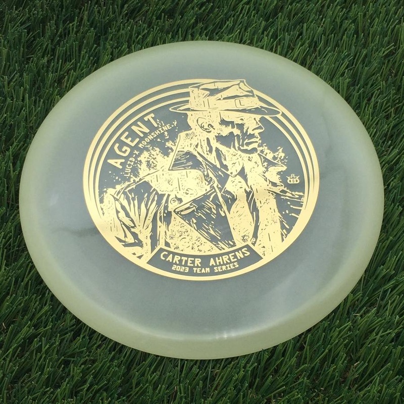 Dynamic Discs Lucid-X Moonshine Glow Agent with Carter Ahrens Secret Agent Team Series 2023 Stamp – 176g – Translucent Glow