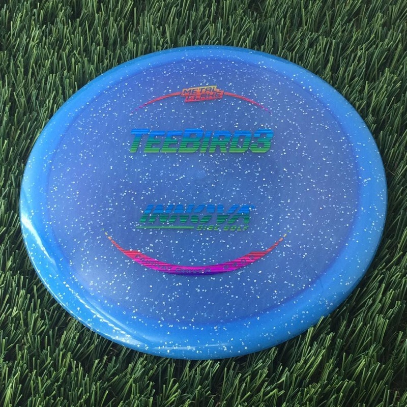 Innova Champion Metal Flake Teebird3 with Burst Logo Stock Stamp – 169g – Translucent Blue