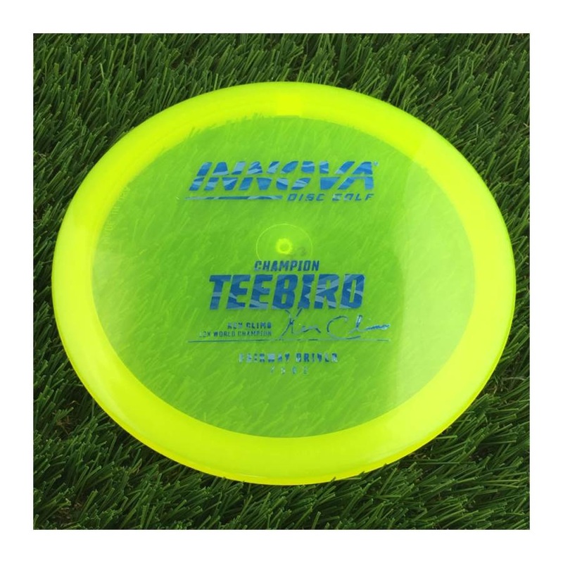 Innova Champion Teebird with Ken Climo 12x World Champion Burst Logo Stamp – 175g – Translucent Yellow