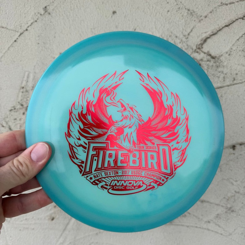 Auction! Jan ’24 – Innova Champion Glow Color Firebird with Nate Sexton 2018 Tour Series Stamp – 175g – Translucent Green