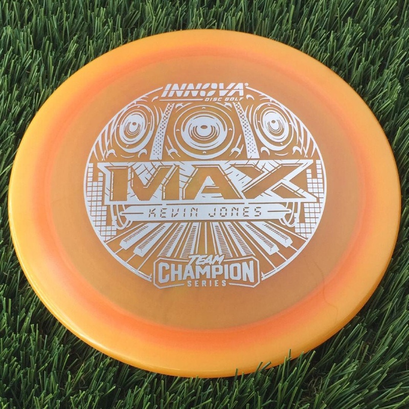 Innova Champion Luster Max with Kevin “KJUSA” Jones Team Champion Series 2025 Stamp – 175g – Translucent Orange